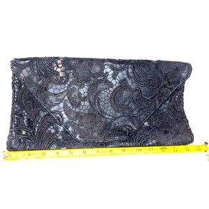 Jessica Simpson leather and black lace clutch